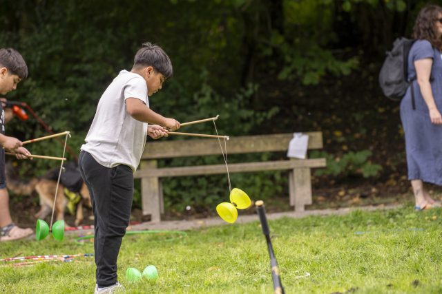 Child doing circus skills