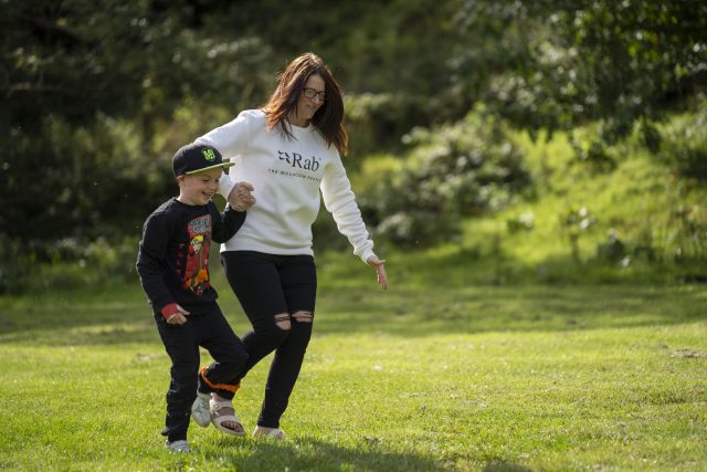 Adult and child in 3 legged race