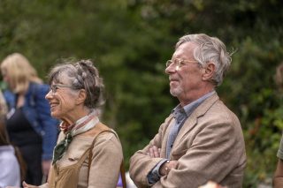 2 adults smiling