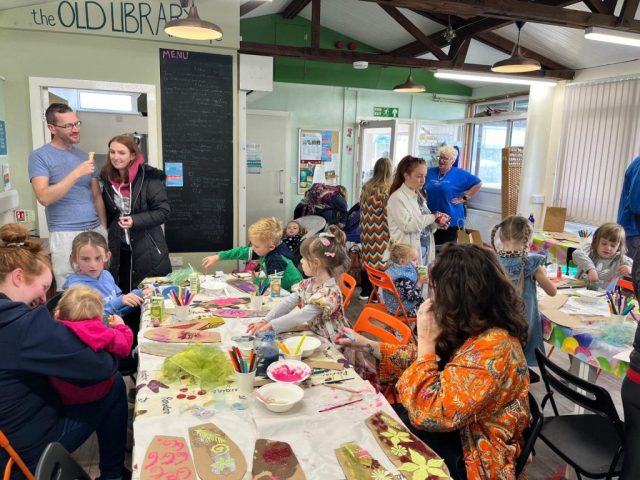 Picture of people participating in craft workshop